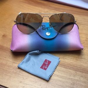 Brown and gold aviator Ray Bans